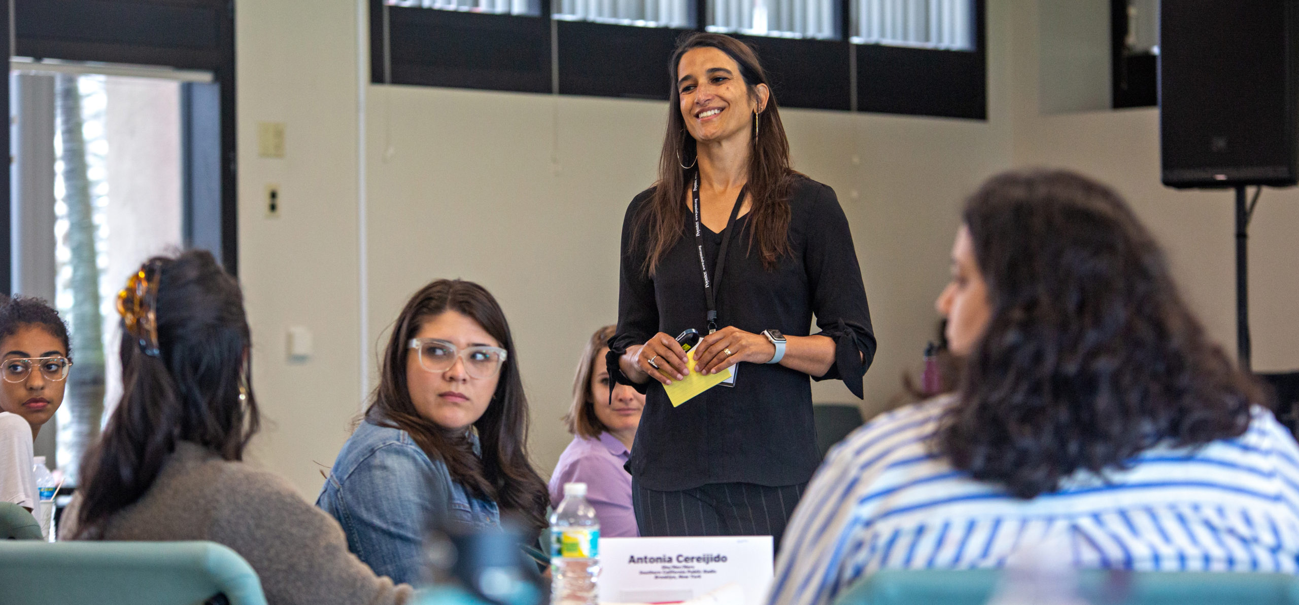 Sitara Nieves cropped WLA Poynter faculty Sitara Nieves stands in a Poynter classroom to teach diverse women about leadership.